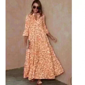 All over print flare sleeve ruffle hem-smock dress in size Large. Never worn.